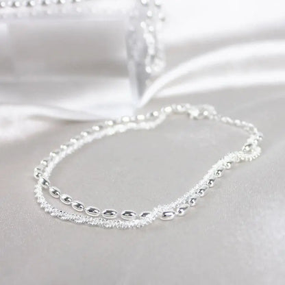 Elegant silverarmband med zirkoniastenar 