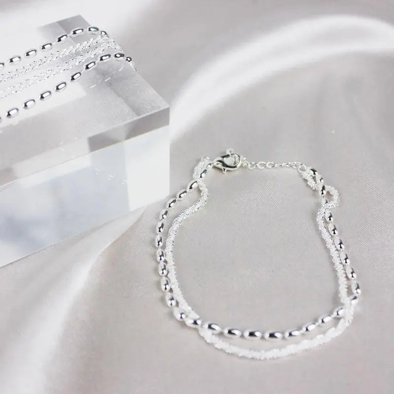 Elegant silverarmband med zirkoniastenar 