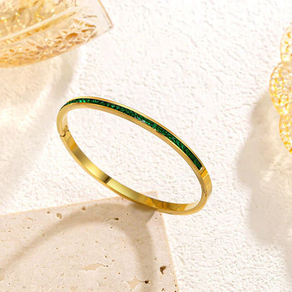 Gyllene grönt armband