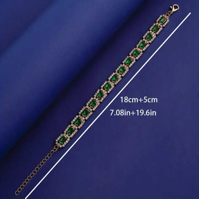 Glänsande armband med smaragd